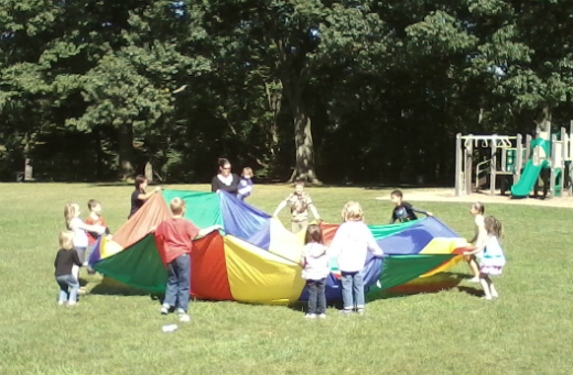 Students playing in a park image
