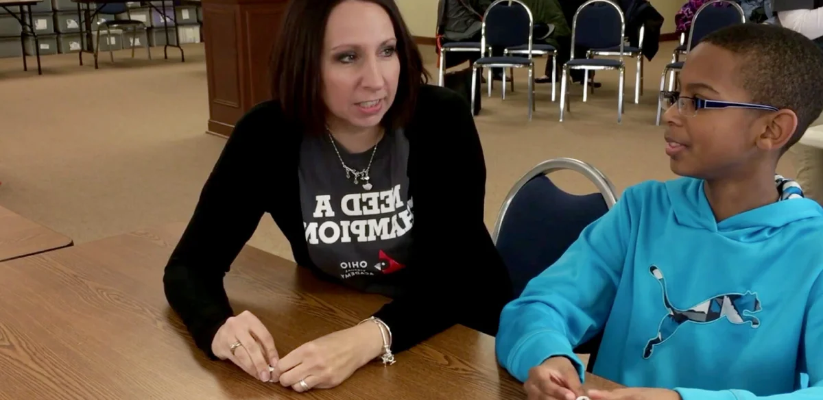 Mother and son talking