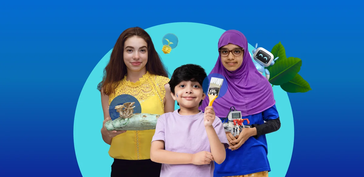 A girl with an art project, a boy holding a brush and another girl with a small robot