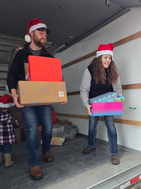 photo of OHVA students and/or alumni participating in a toy drive