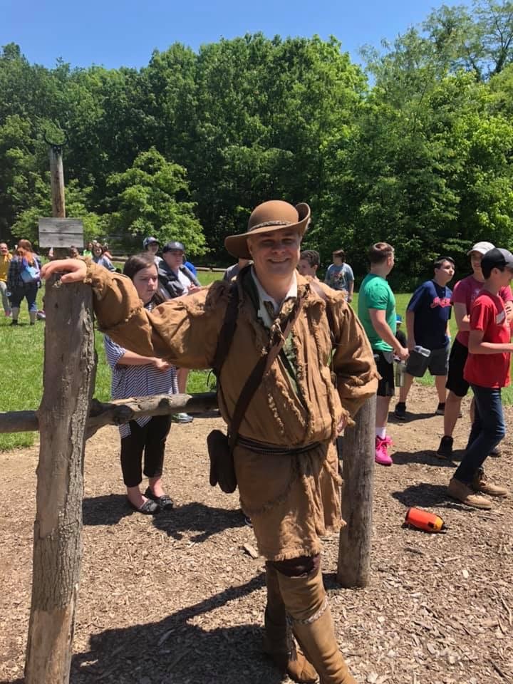 teacher Stephen Hodges at a camp with students