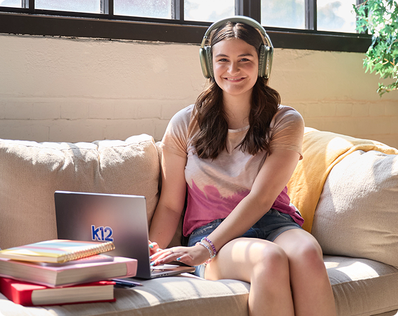 High School student working with her laptop at home